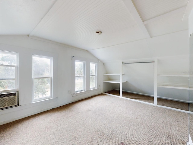 bonus room featuring lofted ceiling and carpet floors