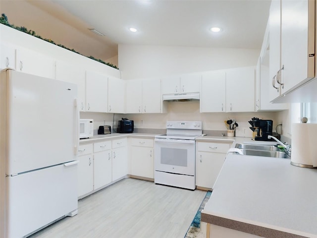 kitchen with white appliances, white cabinets, high vaulted ceiling, light hardwood / wood-style flooring, and sink