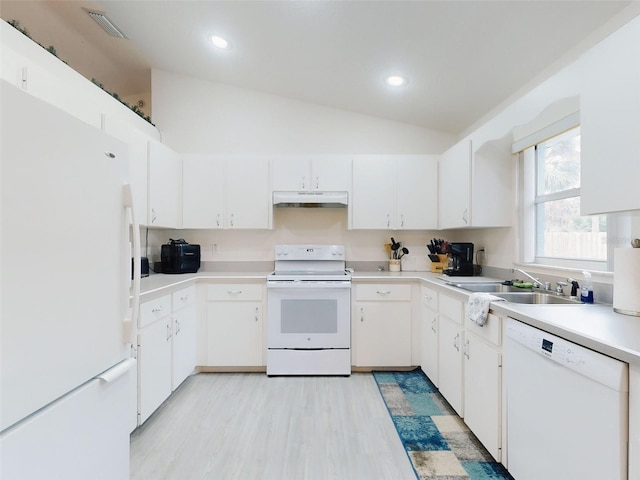 kitchen with white appliances, white cabinetry, sink, vaulted ceiling, and light hardwood / wood-style flooring