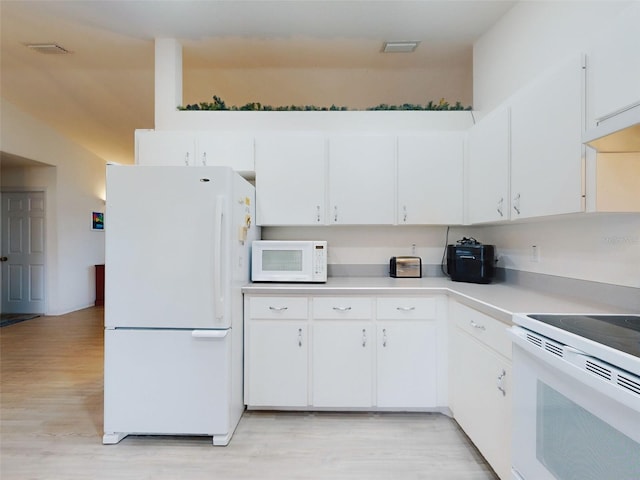 kitchen featuring light wood-type flooring, white cabinetry, and white appliances