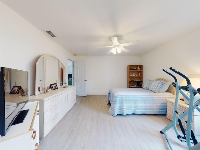 bedroom featuring ceiling fan and light hardwood / wood-style floors