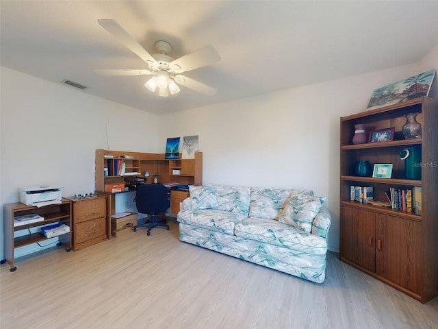 office area featuring ceiling fan and light wood-type flooring