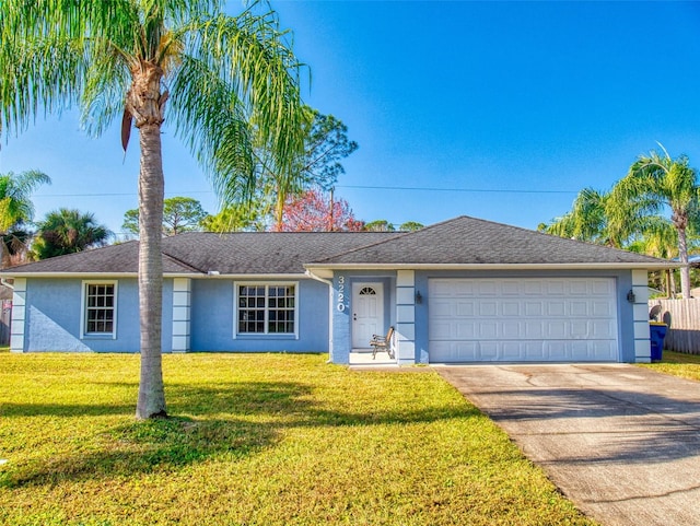 ranch-style house with a front lawn and a garage