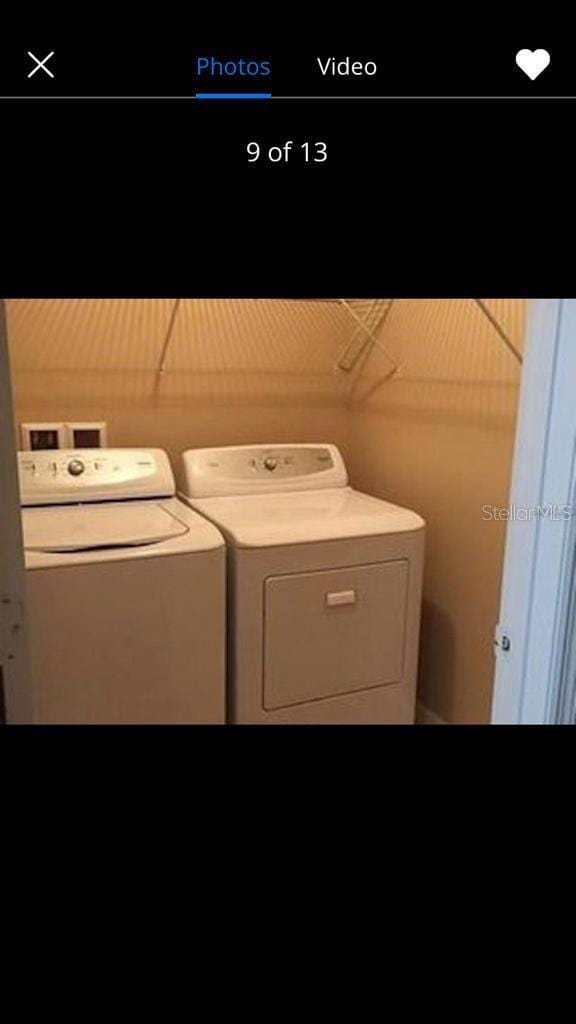 laundry room featuring separate washer and dryer