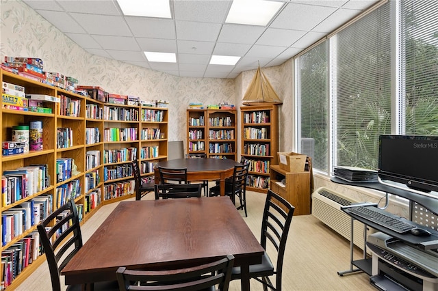 office space featuring a paneled ceiling