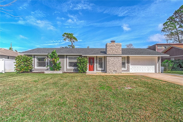 ranch-style home featuring a garage and a front yard