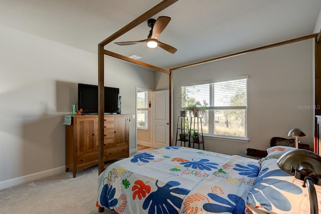 bedroom featuring light carpet and ceiling fan