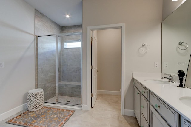 bathroom with vanity and an enclosed shower