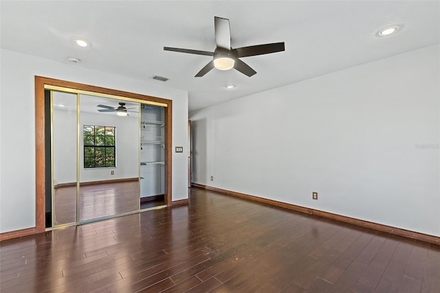 empty room featuring dark wood-type flooring