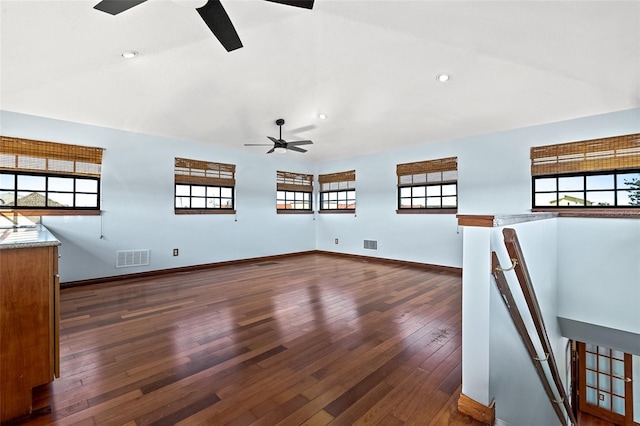 unfurnished living room with dark hardwood / wood-style flooring