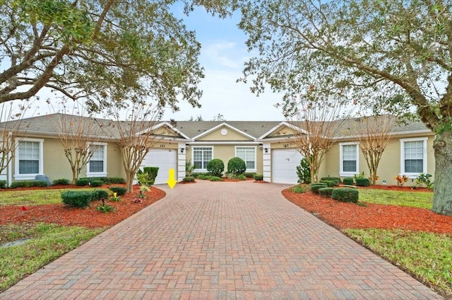 ranch-style home with a garage