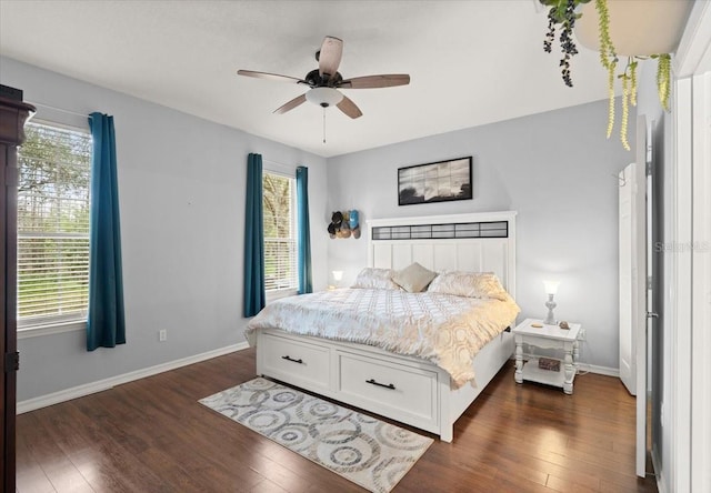 bedroom featuring dark hardwood / wood-style floors and ceiling fan