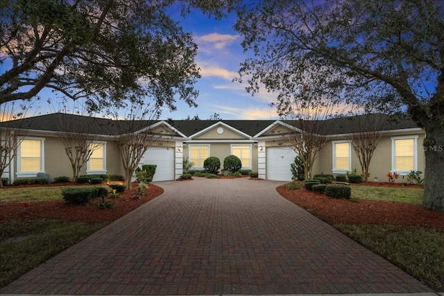 single story home featuring a garage