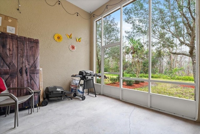 sunroom featuring a wealth of natural light