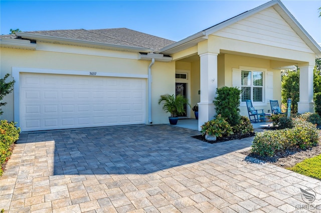 view of front of home with a garage