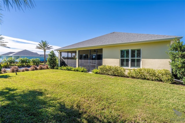 view of yard featuring a sunroom