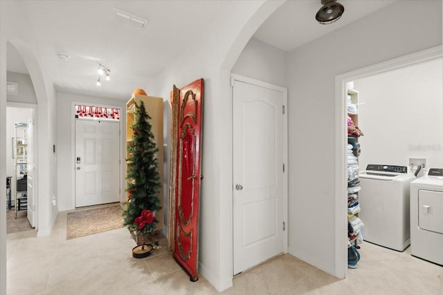 interior space featuring washer and clothes dryer