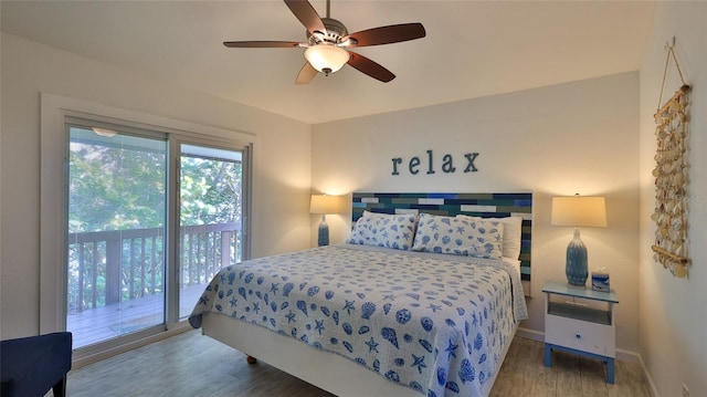 bedroom featuring access to exterior, ceiling fan, and hardwood / wood-style floors