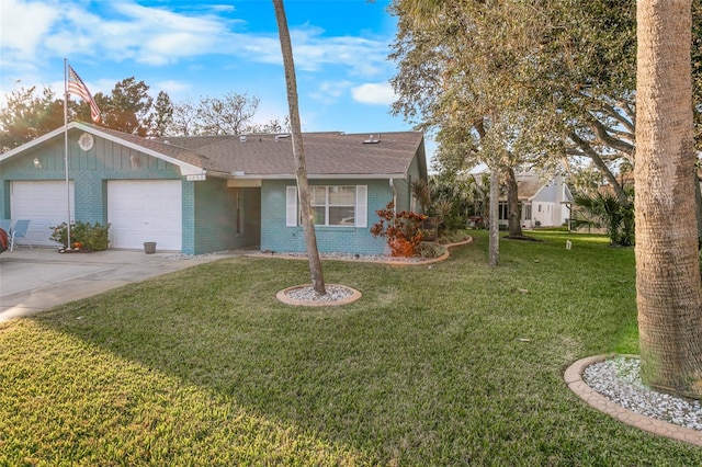 single story home featuring a front lawn and a garage