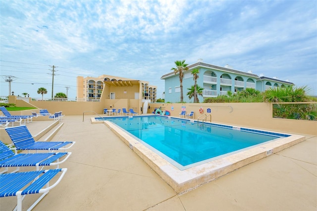 view of pool with a patio area