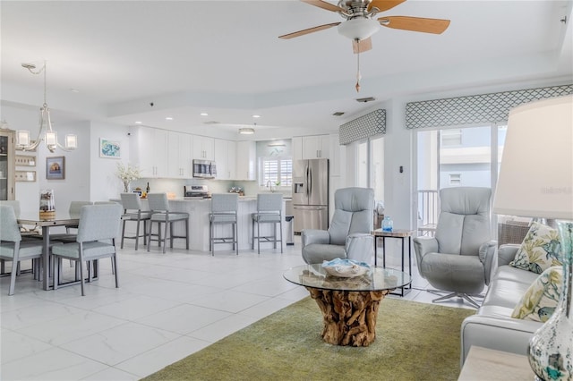 living room featuring ceiling fan