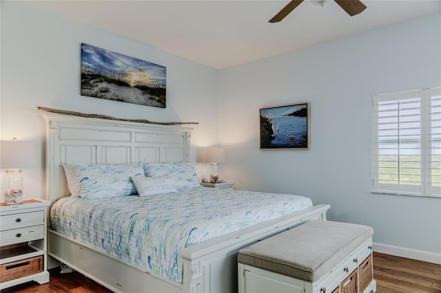 bedroom featuring dark hardwood / wood-style flooring and ceiling fan