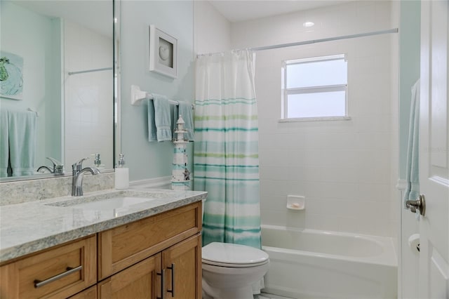 full bathroom featuring vanity, shower / tub combo, and toilet