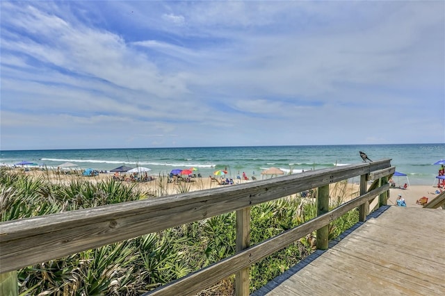 view of water feature with a beach view