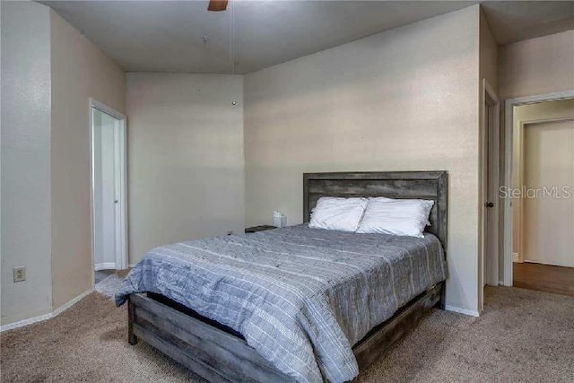 bedroom with ceiling fan and carpet flooring