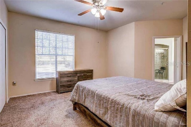 bedroom with ceiling fan and light colored carpet