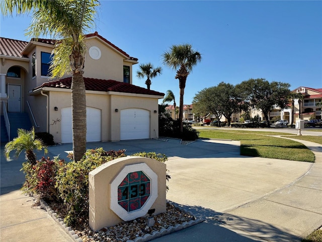 view of property exterior featuring a garage