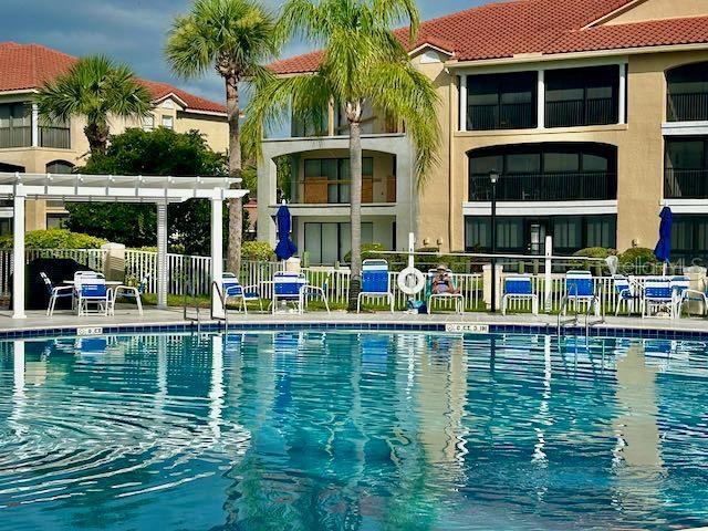 view of swimming pool featuring a pergola