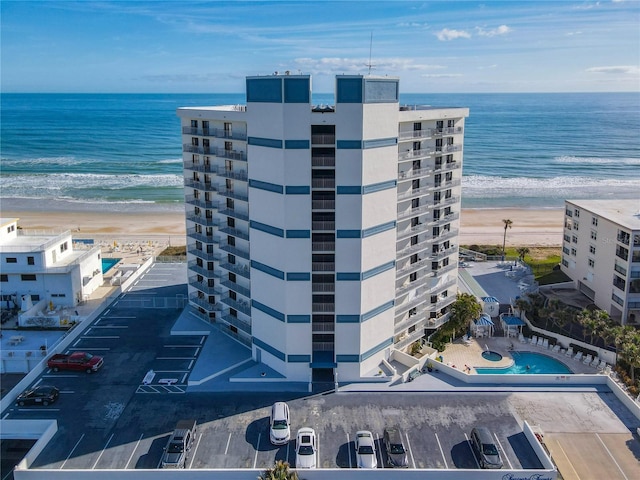 bird's eye view with a view of the beach and a water view