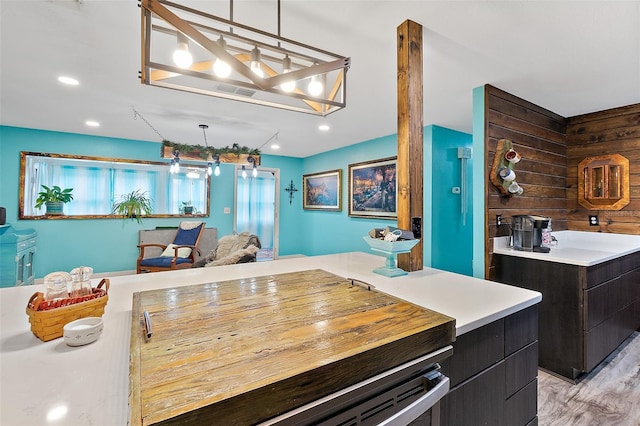 kitchen with a center island and hanging light fixtures