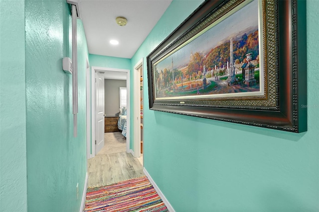 hallway featuring light wood-type flooring