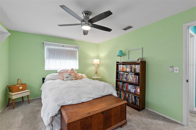 carpeted bedroom featuring ceiling fan