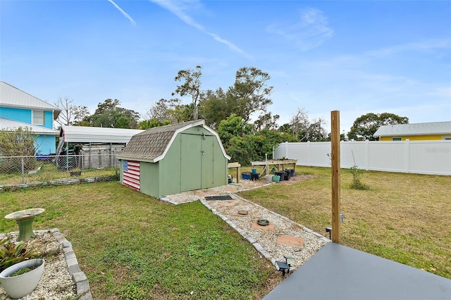 view of yard with a storage unit