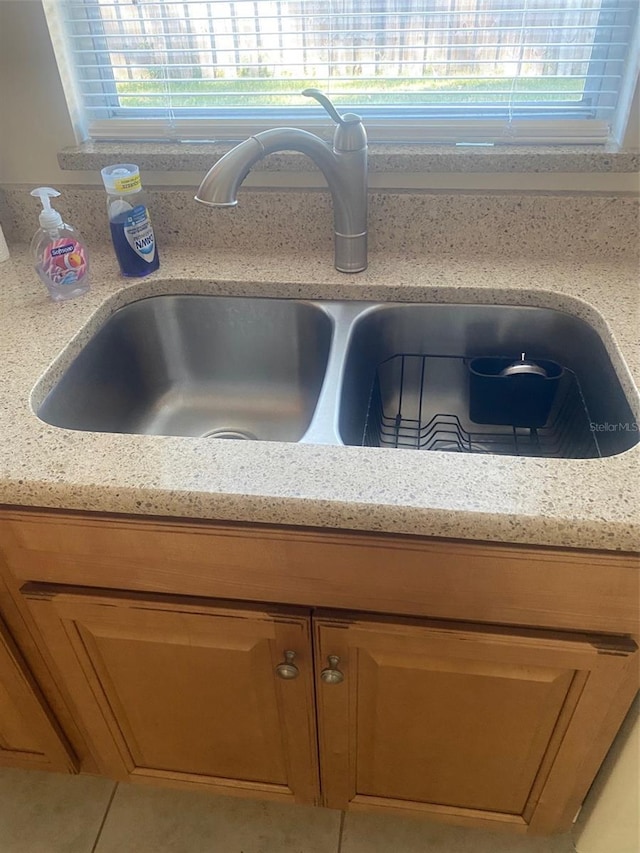 details with light stone counters and sink