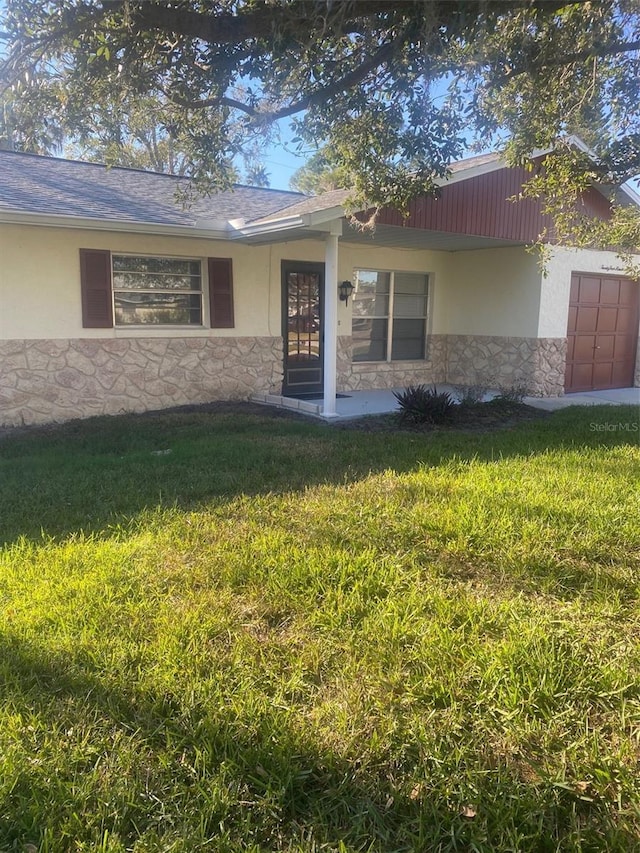 exterior space featuring a yard