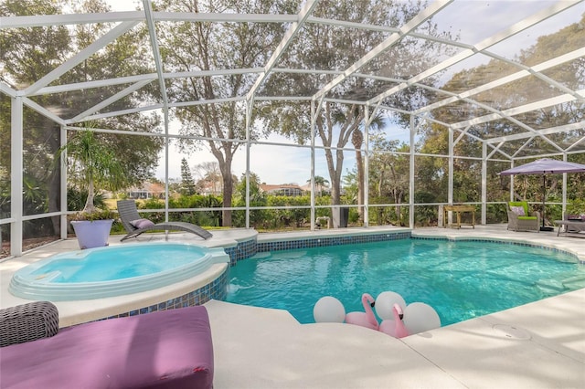 view of pool with a lanai and a patio area