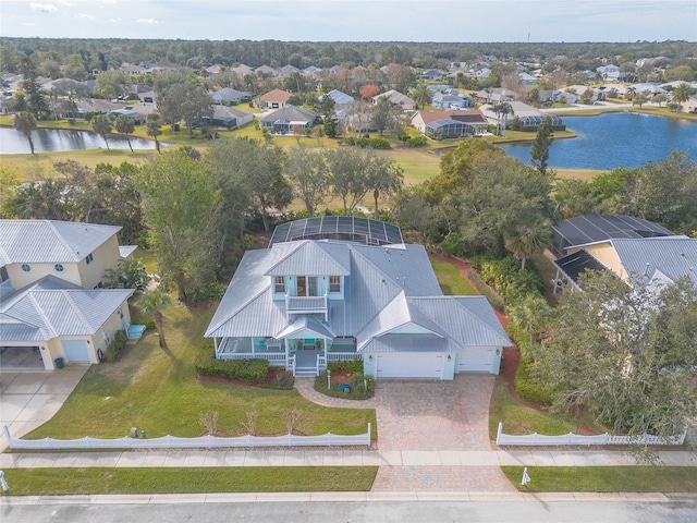 drone / aerial view with a water view