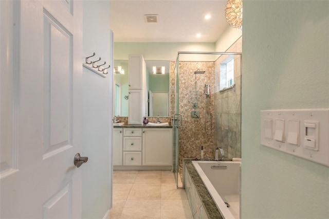 bathroom with shower with separate bathtub, tile patterned floors, and vanity