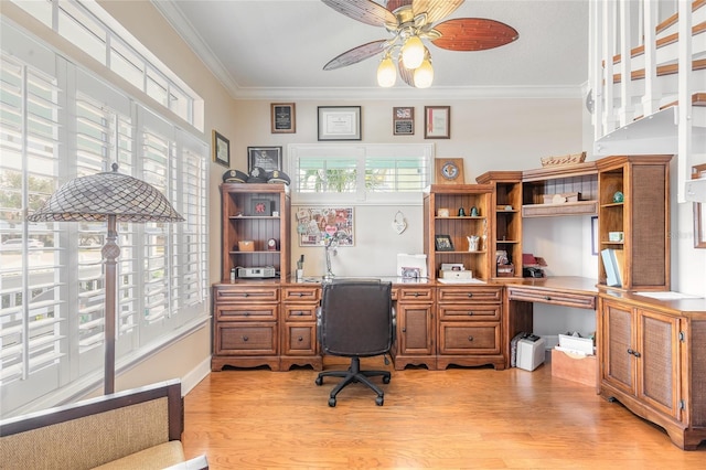 office with ceiling fan, crown molding, and light hardwood / wood-style floors