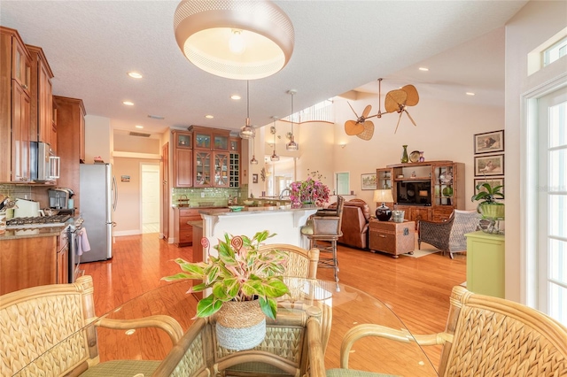 dining space featuring light hardwood / wood-style flooring