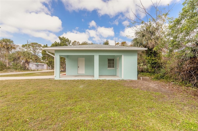 exterior space with a yard