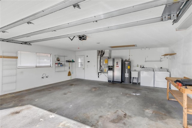 garage featuring a garage door opener, sink, separate washer and dryer, stainless steel fridge with ice dispenser, and electric water heater