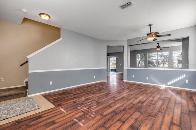 2707 Atlantis Dr, New Smyrna Beach, FL 32168 - unfurnished living room featuring hardwood / wood-style flooring