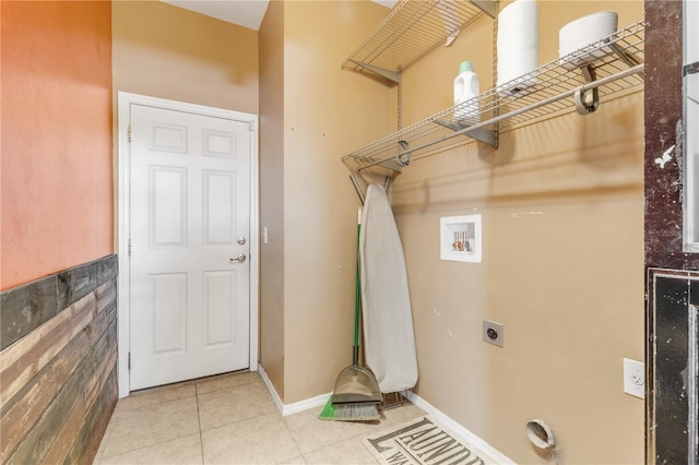 2707 Atlantis Dr, New Smyrna Beach, FL 32168 - laundry room featuring hookup for an electric dryer, tile patterned flooring, and hookup for a washing machine