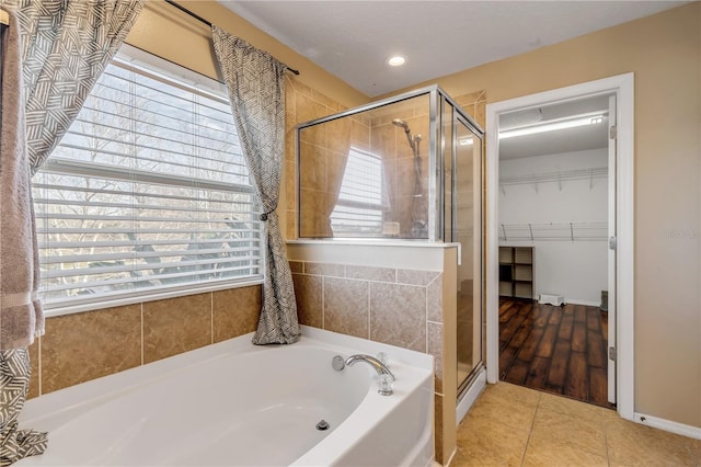 2707 Atlantis Dr, New Smyrna Beach, FL 32168 - bathroom with tile patterned floors and plus walk in shower
