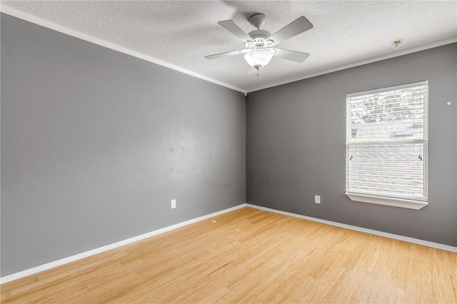 2707 Atlantis Dr, New Smyrna Beach, FL 32168 - empty room with ceiling fan, light hardwood / wood-style floors, and a textured ceiling